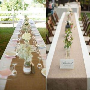 May include: Two wedding tables decorated with burlap table runners. The table on the left has white flowers in glass vases and white plates with pink napkins. The table on the right has a sign that says "Reserved for Family" and a vase of pink flowers.