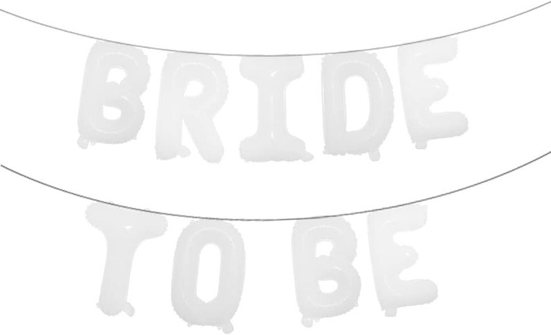 May include: White balloon letters spelling "BRIDE TO BE" hanging on a string. The letters are inflated and ready for a party.