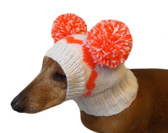 Knitted hat for dog with hearts and two pompons