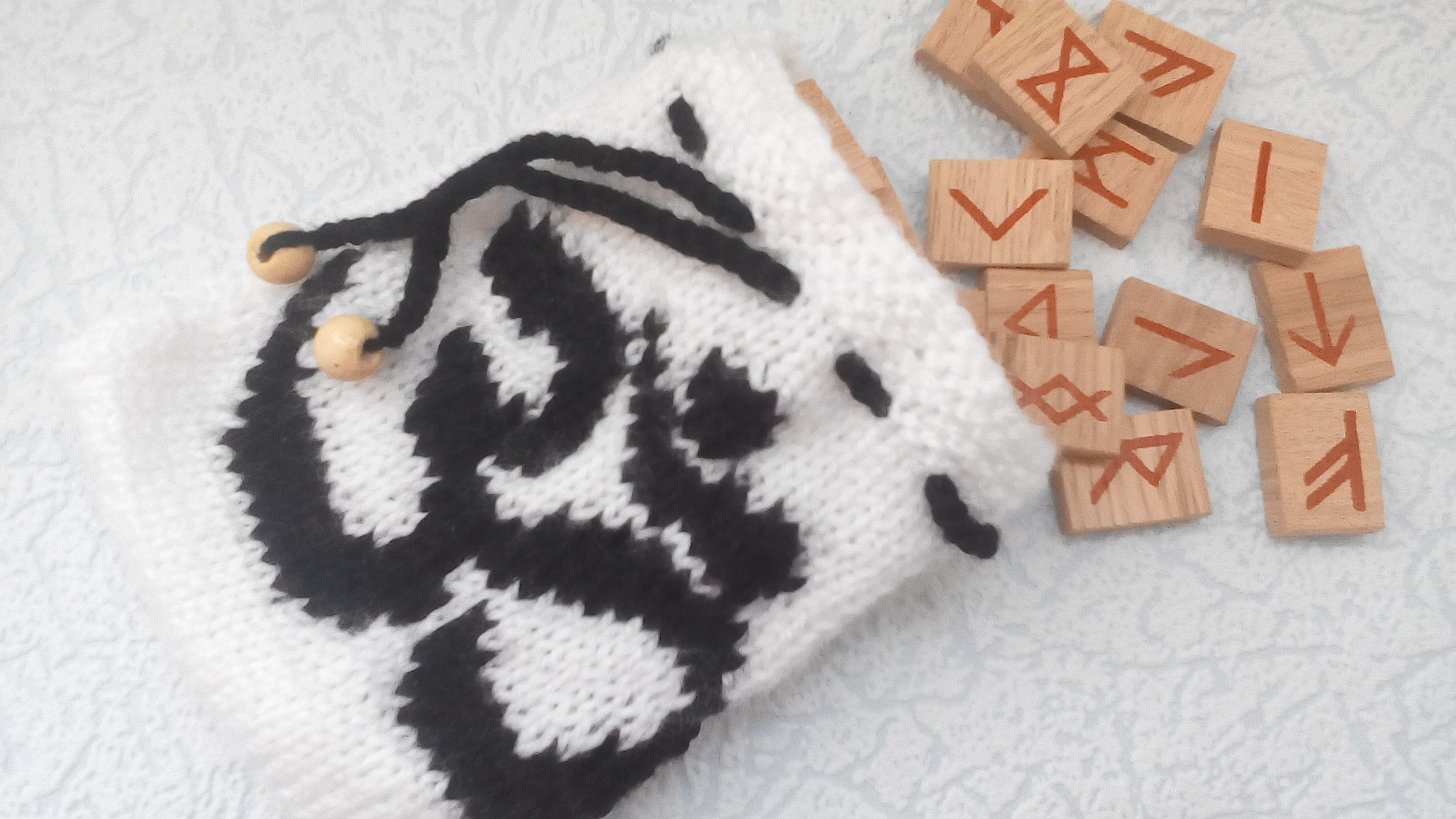 A knitted pouch case for runes with a magic symbol one to Etsy