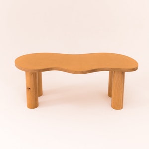Wooden coffee table with organic shape and pretty curves, honey-tinted oil finish image 1