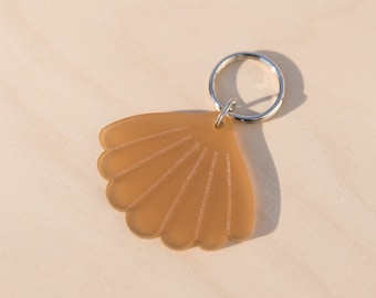 Bio-based and biodegradable shell-shaped key ring