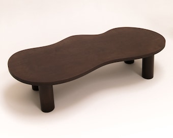 Large wooden coffee table with organic shape and pretty curves tinted oil