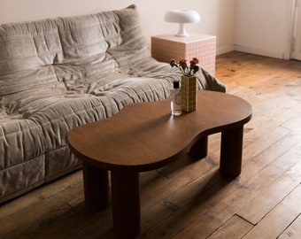 Wooden coffee table with organic shape and pretty curves, Amber tinted oil finish