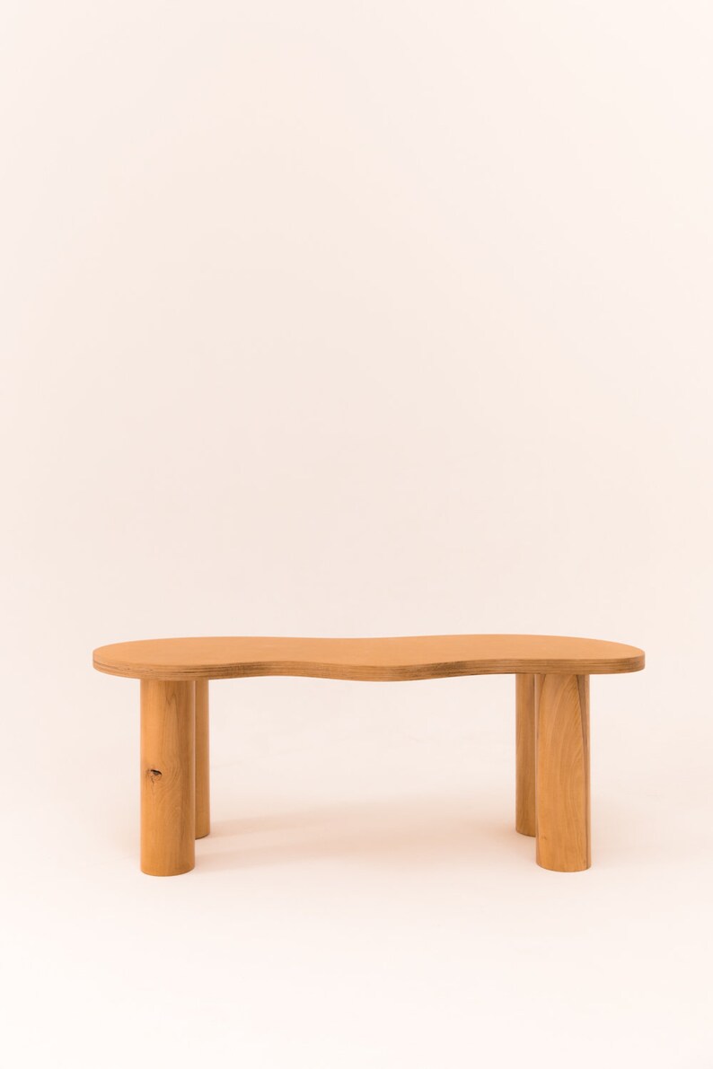 Wooden coffee table with organic shape and pretty curves, honey-tinted oil finish image 4