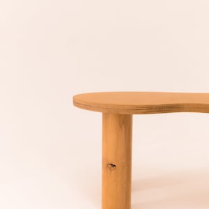 Wooden coffee table with organic shape and pretty curves, honey-tinted oil finish image 6