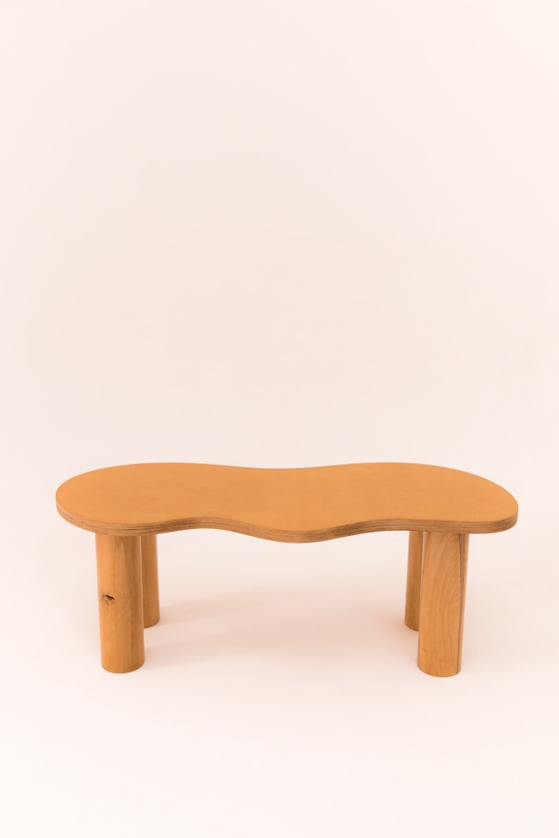 Wooden coffee table with organic shape and pretty curves, honey-tinted oil finish image 1