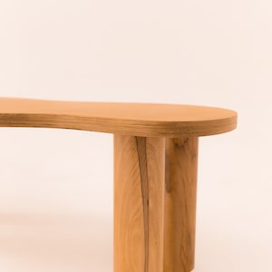Wooden coffee table with organic shape and pretty curves, honey-tinted oil finish image 2