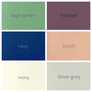 a grid showing the six colours that are available for the large leather wedding photo album. Sage green, heather purple, navy, blush, ivory and dove grey