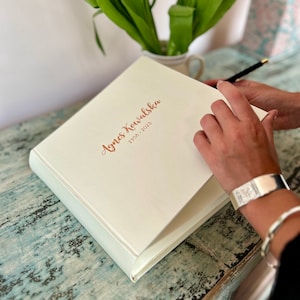 Condolence Book Personalised With The Name Of A Loved One