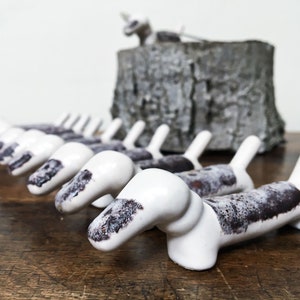Vintage ceramic knife rests, set of 11, dog shape, animal cutlery holder, retro table dressing, decoration, porte couteau - France 50s