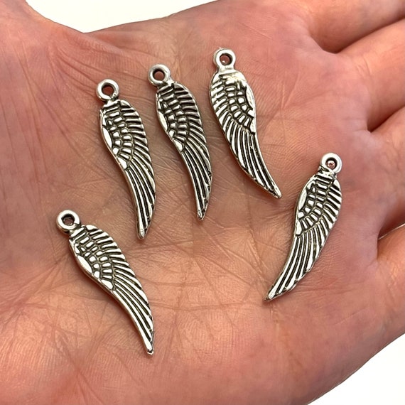 Angel Wing Charm Antiqued Sterling Silver Angel Wing Charm Antiqued Sterling Silver