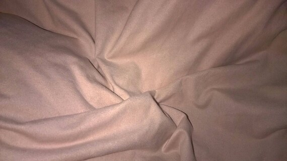tissu skai ou simili cuir avec coutures col marron foncé vente au demi metre