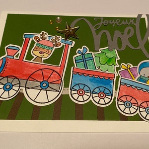 Carte d’une livraison express de Noël par comète et son ami le pingouin à bord du train du pôle nord