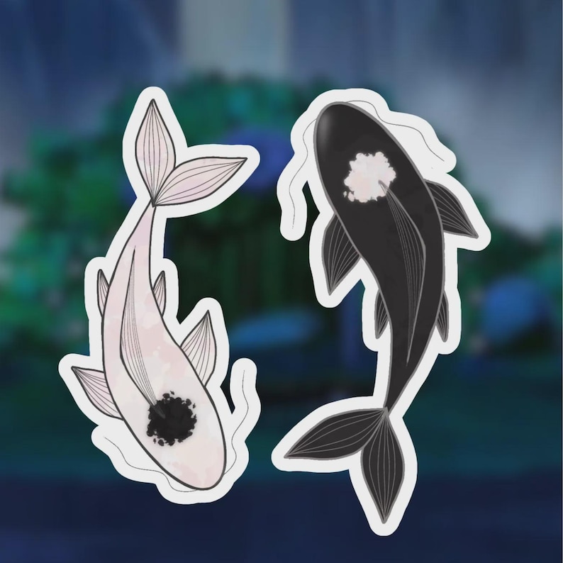 May include: Two koi fish stickers. One is light pink with a black spot, the other is black with a white spot. Both have white outlines and are set against a blurred blue background.