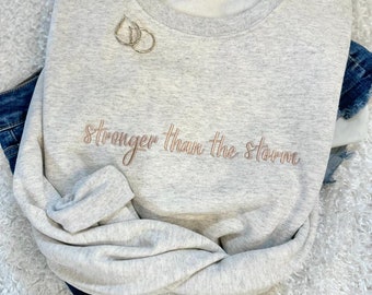 Stronger Than The Storm Embroidered Sweatshirt - Faith Based Apparel - Christian Sweatshirt - Trendy Christian Sweatshirt