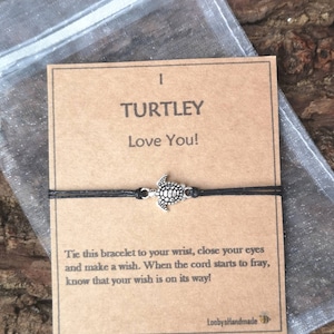 Simpatico braccialetto a forma di tartaruga dei desideri I Turtley Love You, regalo dell’amicizia, nero, divertente gioco di parole