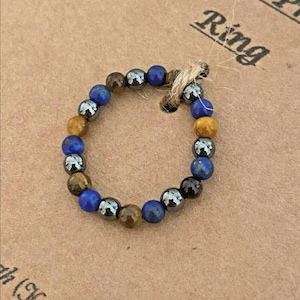 Stärke Schutz Edelstein Ring Stapeln Heilung Kristall Ring Hämatit Lapis Lazuli Tigerauge Reiki Hippy Hippie-Perlen Geschenkkarte
