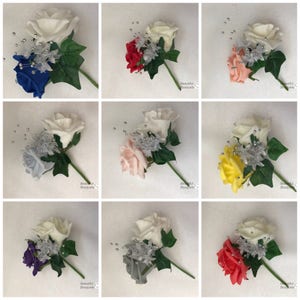 Wedding double buttonhole with crystal pin in the rose and addded silver babies breath flower sprays corsage grooms groommen guests