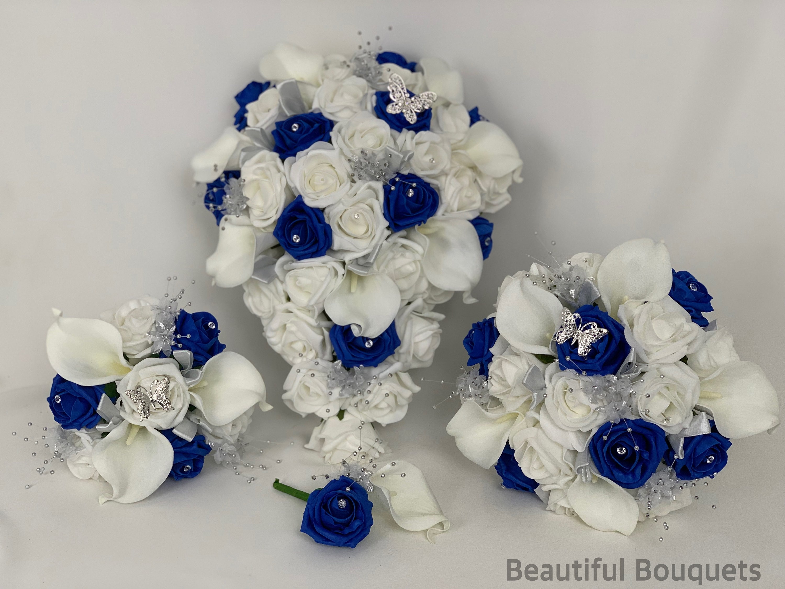 Wedding teardrop bouquet gold & royal blue roses pearls diamantes & butterflies 