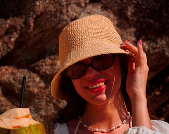 Travel hand crochet Bucket hat Natural Raffia sun hat Wide brim hat Elegant women hat Straw brimmed summer hat