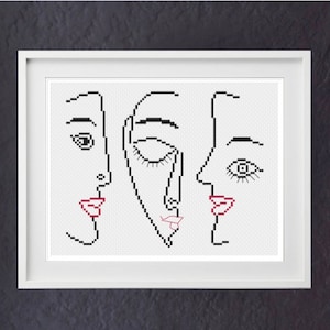 May include: A black and white line drawing of three faces with red lips. The faces are stylized and abstract.
