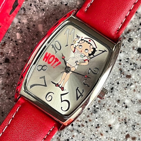 Betty Boop pin up AVON Vintage reloj nunca usado NUEVO con batería y correa de cuero este es Betty Boop HOT reloj de enfermera viene en caja original