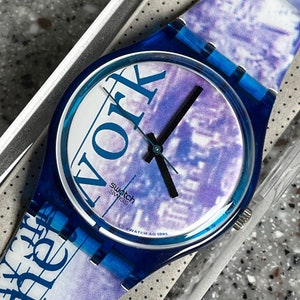 Vintage Swatch Watch 1996 called Networks in original box never worn with a battery striking blue white and black 34mm fabulous swatch.