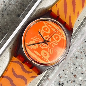 Swatch 1993 Watch Vintage Skin Print NEW never worn in box with battery 34mm face attractive tiger print orange and brown swatch watch