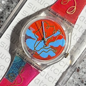 Swatch Watch 34mm everyday colorful swatch gold, pink NEW never worn with battery in box great spring time swatch watch