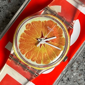 Swatch Watch 41mm RARE Vitamine Boost clear swatch band everyday swatch with battery in box running well oranges florida and fun swatch