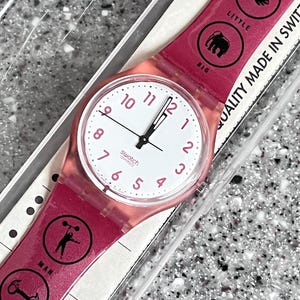Vintage Swatch GR130 VARIANT special with rare original band working unworn in box 34mm swatch pink with symbols on the band with battery