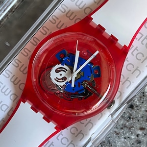 Swatch Watch Clownfish red white blue patriotic 41mm face silicone strap great everyday watch new never worn with battery and running