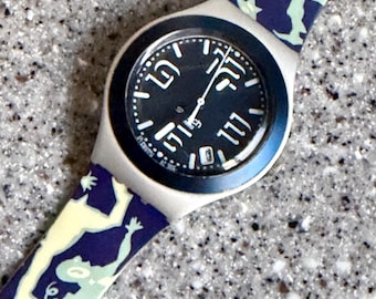 Pre owned IRONY aluminum 38mm face with a replacement band running with battery no box great swatch watch from 90s