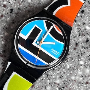 Swatch Watch GB227 Color full says swatch NIB new old stock 34mm face with box and battery fabulous limited swatch watch great for everyday