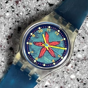 1992 pre-owned good condition Vintage Swatch Watch no box running with battery 25mm LK135 Rising Star fish beach theme swatch watch rare