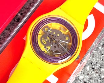 Purple rings yellow swatch watch 41mm NEW never worn in original box with battery SO29J100 great everyday swatch watch fabulous colors