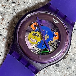 Swatch Watch Purple Lacquered larger 41mm new in box skeleton gears never worn with battery Swatch Watch