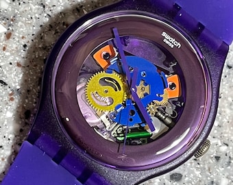 Swatch Watch Purple Lacquered larger 41mm new in box skeleton gears never worn with battery Swatch Watch