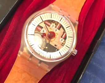 Reloj Swatch Vintage Peter Gabriel “Adam” Musical SLZ106 nuevo de antiguo stock nuevo en caja con batería, reproduce música RARO estado impecable