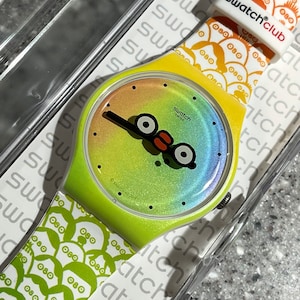 Swatch Watch What’s Yo Face Rare NWT in box with battery rainbow colors Swatch CLUB limited watch 41mm face silicone band