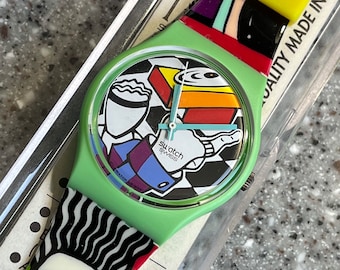 1994 Vintage Swatch Watch RARE NWT never worn in box with battery from the Comic’s line of Swatch GG134 called Rapp-er 34mm face running