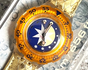 Vintage Scuba Swatch Watch 91-92 Golden Island SDK211 model NEW condition running in box with battery leather gold strap 38mm case great!