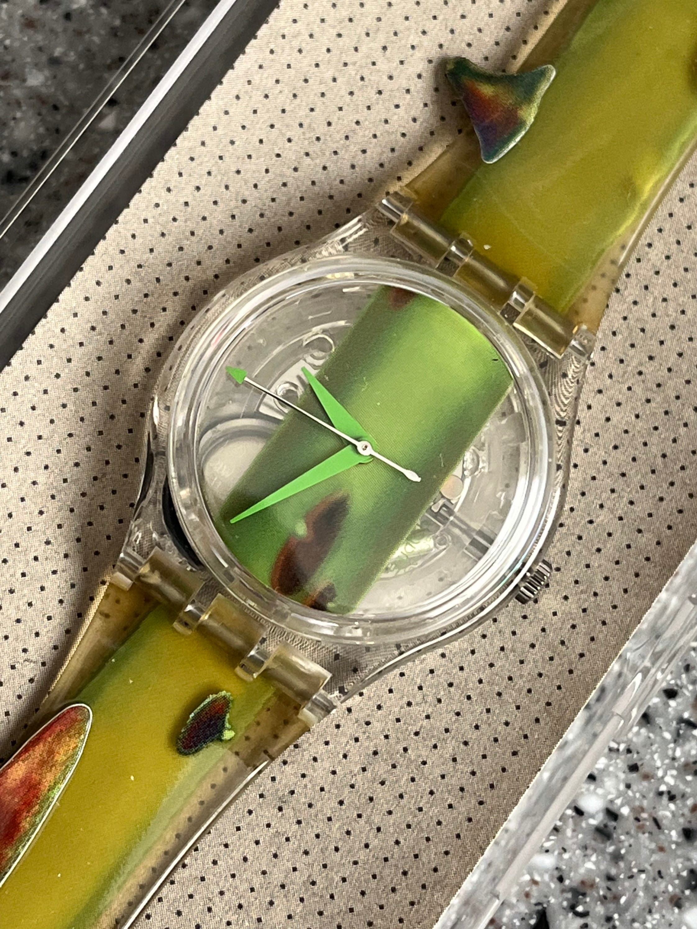 Vintage Swatch Watch 34mm face Never Worn in original box with battery from 1997.  Called Piquant GK267. Thorny rose stem swatch watch green