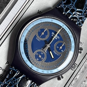 Swatch Vintage NEW 1993 Silver Star SCN102 unworn in box with battery chrono chronograph 38mm face running with leather designed band swatch
