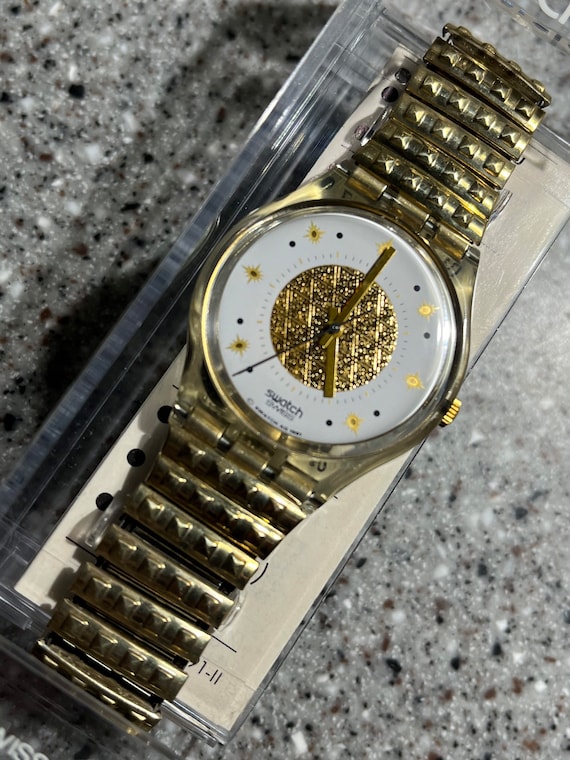 Swatch golden shop silver