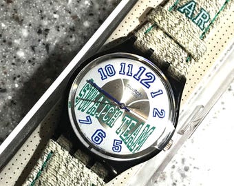 Swatch Watch Vintage 90s New Old Stock never worn in original box with battery running Champ Team Swatch watch GM125 model