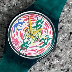 Pre owned Swatch Watch GIROTONDO Dial 34mm face GG129 plastic green new replacement band with new battery and running no box