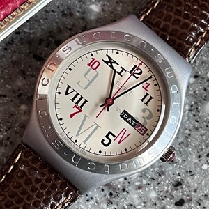Swatch Vintage Aluminum case Swatch Irony Big PROMENADE YGS4000 never worn in original box with battery comes with silicone band for wear