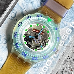 Swatch Watch Vintage Scuba 1993 watch Blue Ice SDK107 38mm with battery unworn condition no scratches fabulous original swatch watch no box